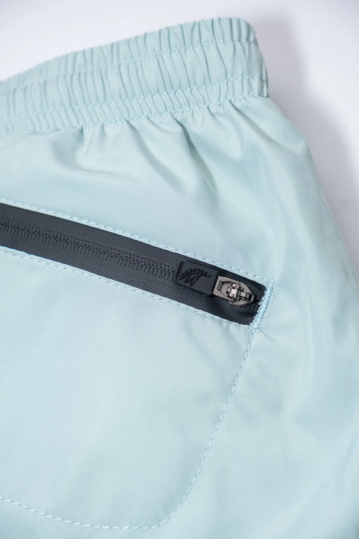 Mint Solid Runner Swim Trunks